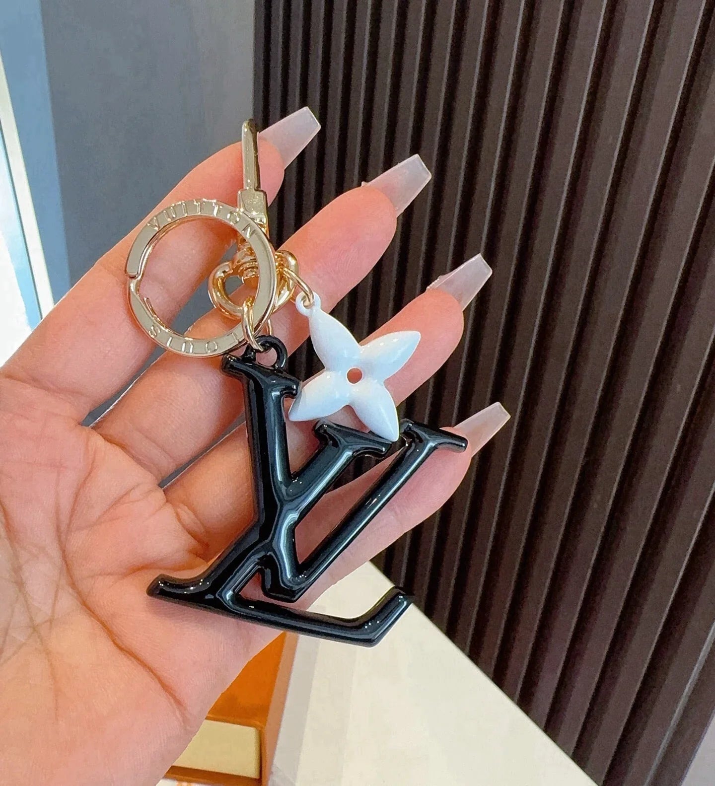 LV Logo Charm 415613